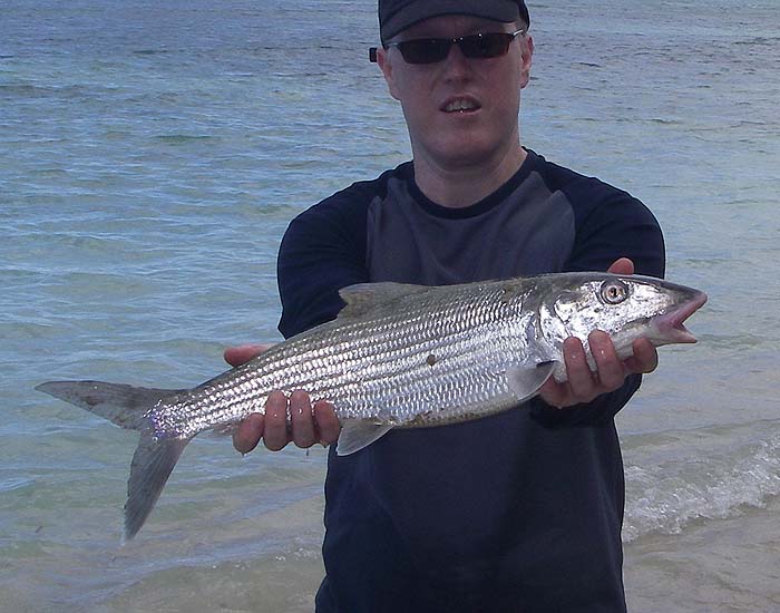 Richard displays my bonefish from the previous shot.  It was, by some margin, the smallest one we caught on this trip.