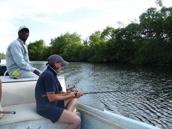Trolling in the mangrove lined estuary of Deep River.