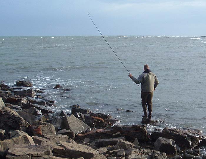 This one was a bit bigger and certainly fought harder - note the rough, dirty sea did not stop the fish taking plugs.