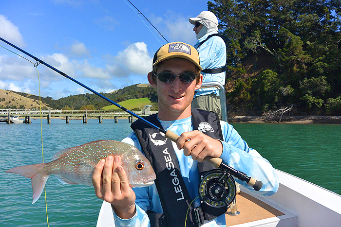 Max with a small but beautiful fly-caught snapper.