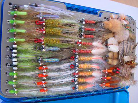 One of Alan's fly boxes bulging with his creations.