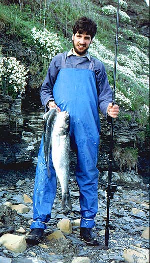 Note that this was in the days when we kept some bass and long before we wore 'chesties'.  The rubber bands round Martin's ankles are to slow down the rising water inside his over trousers.  We always finished up soaking wet.