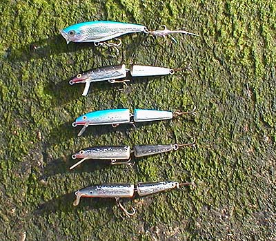 A range of lures to cover most contingencies.  Only the bottom one is a sinker, the rest all float and have been 'doctored' to fish at progressively greater depths.