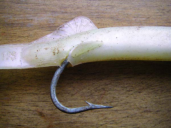 The large coarse hook on this plastic eel is typical of the ones fitted.